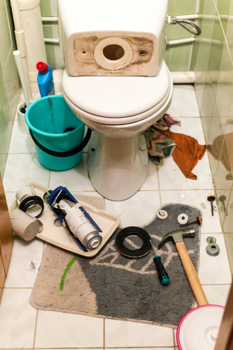 New toilet being installed in a Abbots Langley bathroom